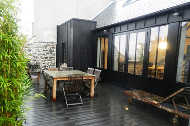 Idée de décoration pour une terrasse design.