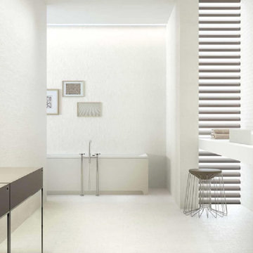 Modern white bathroom with subtle white porcelain tile walls