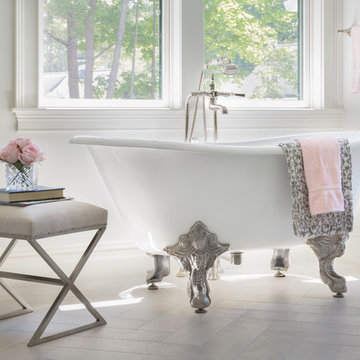 Master bath with vintage style soaker tub