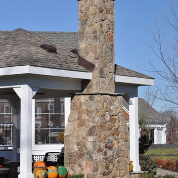 patio,pavilion,outdoor fireplace,indoor fireplace,grill,walkway,walls.