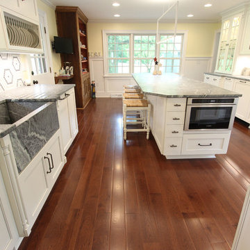 White Cabinets, Grey Countertops and Edgy Tile Backsplash