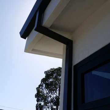 Costa Mesa, New Modern Home. Angle Face 5 inch Gutters, Smooth Downspouts.