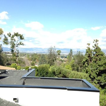 Modern Home with 3" Black Smooth Gutter System