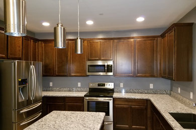 Kitchen - southwestern kitchen idea in Other