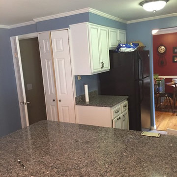 cabinet refacing---white w/ black glaze and granite countertops