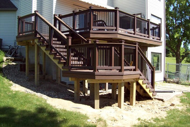 Photo of a mid-sized traditional backyard deck in Detroit with no cover.