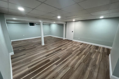 Basement - large traditional basement idea in Other