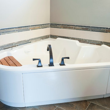 Master Bath with Jetted Tub, Tile Backsplsh, and Oil Rubbed Bronze Tub Filler