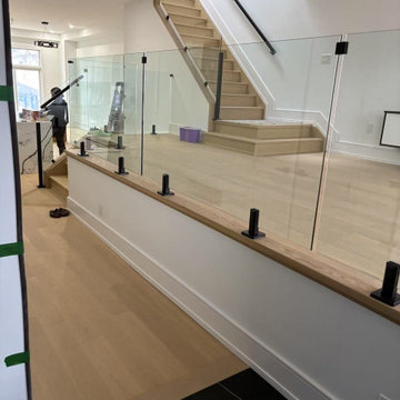 Frameless Glass Stair Railing with Matte Black Hardware