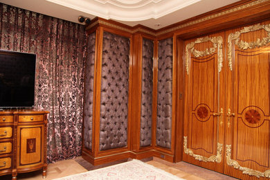 Mid-sized elegant master beige floor bedroom photo in New York with brown walls and no fireplace