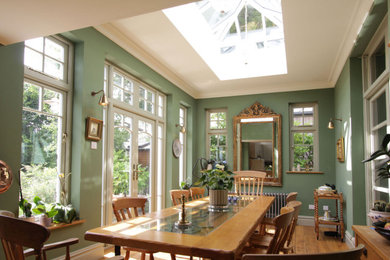 Photo of a classic dining room in Hertfordshire.