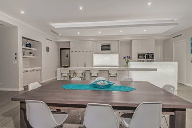 Inspiration for a contemporary open plan dining in Perth with grey walls, ceramic floors and grey floor.