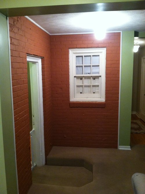 Removing paint from brick.