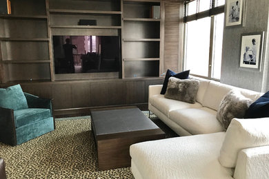 Example of a trendy family room design in New York