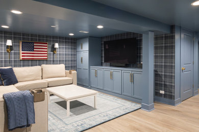 Basement - mid-sized transitional look-out beige floor and wallpaper basement idea in Chicago with blue walls