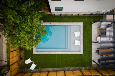 Inspiration for a small contemporary backyard rectangular pool remodel in Austin