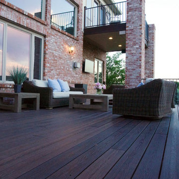Composite deck with metal railing