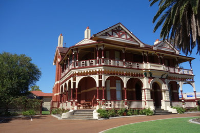 Inspiration for a large traditional two-storey brick exterior in Perth with a hip roof.