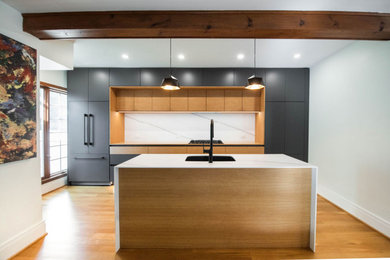 Example of a minimalist kitchen design in New York
