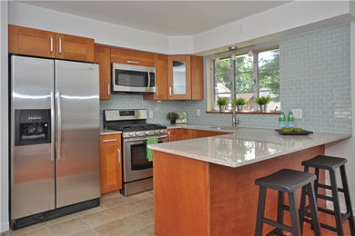This is an example of a contemporary eat-in kitchen in Newark.