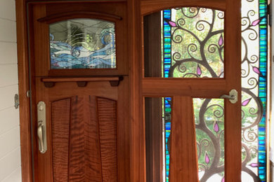 Example of an arts and crafts dutch front door design in San Francisco