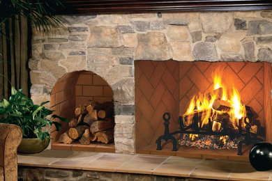 Inspiration for a rustic underground carpeted basement remodel in Albuquerque with a standard fireplace and a stone fireplace