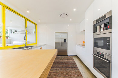 Photo of an eclectic kitchen in Brisbane.