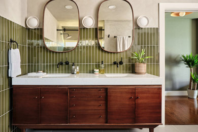 Mid-sized 1960s master green tile and porcelain tile porcelain tile, beige floor and double-sink bathroom photo in Austin with flat-panel cabinets, dark wood cabinets, white walls, an undermount sink, quartz countertops, white countertops and a freestanding vanity