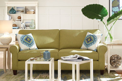 Living room - mid-sized coastal open concept light wood floor living room idea in Jacksonville with white walls and no tv