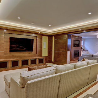 Photo of a medium sized classic home cinema in Calgary with carpet, a wall mounted tv, beige floors and yellow walls.