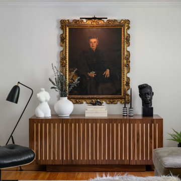 Modern Console Styling With Sculptural Decor & Vintage Portrait