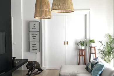 Inspiration for a mid-sized contemporary family room in Rome with white walls.