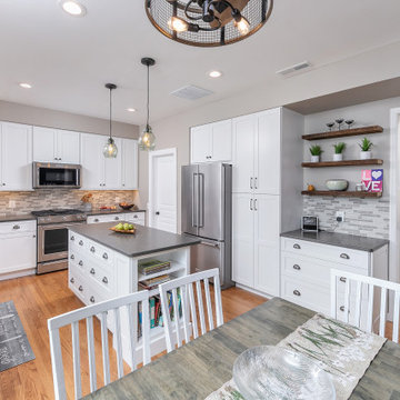Kitchen with White Shaker Cabinetry (and WIne Rack & open shelving)