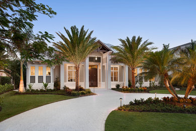 Design ideas for a large transitional one-storey brown exterior in Miami.