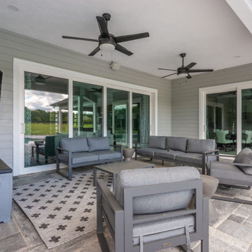 Custom Outdoor Living Space with Sliders and Outdoor TV