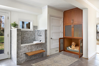 Example of a mid-sized classic gray floor laundry room design in DC Metro with white walls