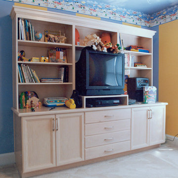 Various custom fireplace mantles, bookcases, and entertainment centers.
