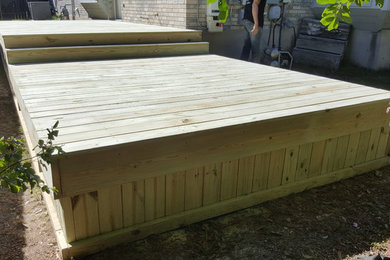 Inspiration for a large backyard deck remodel in Austin with no cover