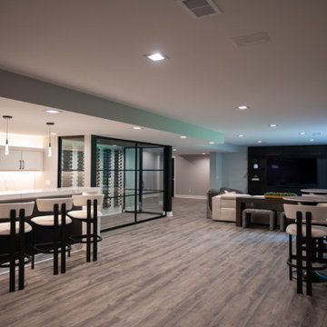 Finished Basement with Seated Bar, Wine Room and Golf Simulator in Rochester, MI