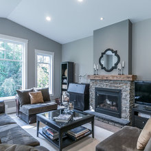Gray walls with stone fireplace