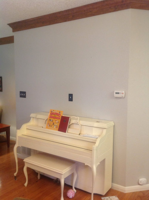 How/what to hang above off center piano?