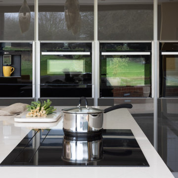 Contemporary Handleless Intuo Kitchen with T-shaped Island