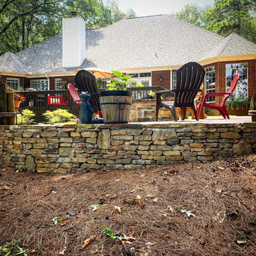 Flagstone patio and Moss rock Wall