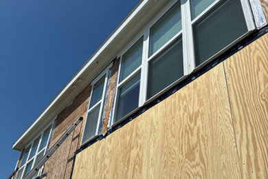 Inspiration for a large blue house exterior remodel in Wilmington