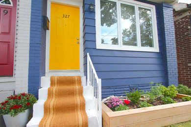 Inspiration for a coastal exterior home remodel in Toronto
