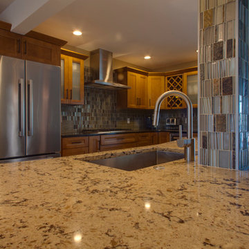Beautiful granite with glass tile column wrap