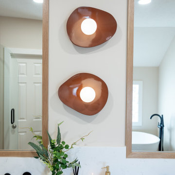 Primary & Guest Bathroom Remodel with Improved Layout and Heated Terrazzo Floors