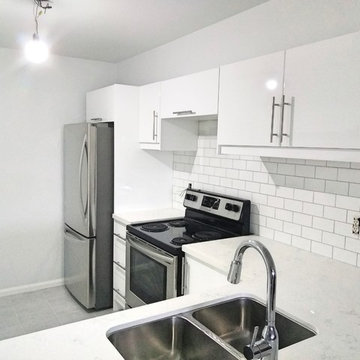 L - shape kitchen (10 ft x 6 ft) with withe quartz countertop
