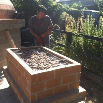 The Castillo Family Wood Fired Pizza Oven & La Caja Style Pig Roaster in WA