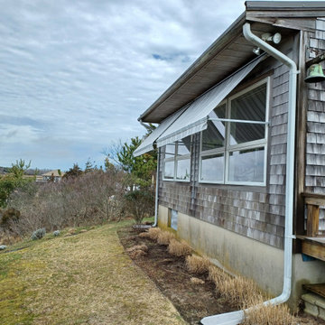 Retractable Window Awnings for a home on Cape Cod
